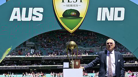 Former Australia cricketer Allan Border stands next to The Border-Gavaskar Trophy at the end of fifth cricket Test match between Australia and India at the Sydney Cricket Ground on January 5, 2025.