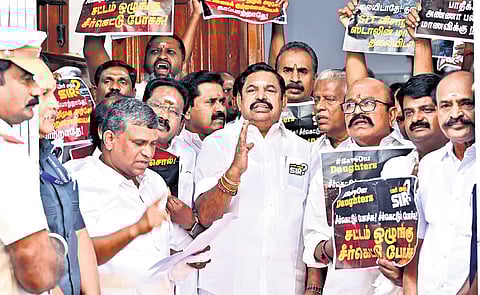 DMK leaders along with their party cadres staged a protest against governor RN Ravi for humiliating Tamilthai vaazhthu at Panagal Maaligai in Saidapet on Tuesday.