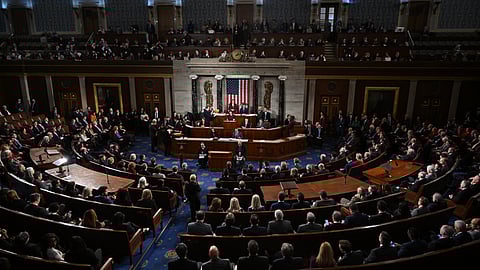 US Vice President Kamala Harris and Speaker of the House Mike Johnson preside over a joint session of Congress to certify the results of the 2024 Presidential election, inside the House Chamber at the US Capitol on January 6, 2025, in Washington, DC.