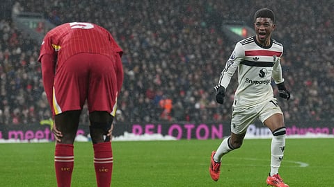 Manchester United's Amad Diallo celebrates after scoring his side's second goal against Liverpool during the English Premier League soccer match at the Anfield stadium in Liverpool, England, Sunday, Jan. 5, 2025. 