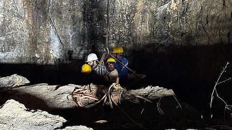 The mine with a 20 ft radius is about 300 ft deep and the water level inside it has risen to more than 100 ft.
