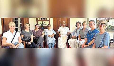 Members of the book club from New York with Jose Dominic and wife at their Kottayam farmstead