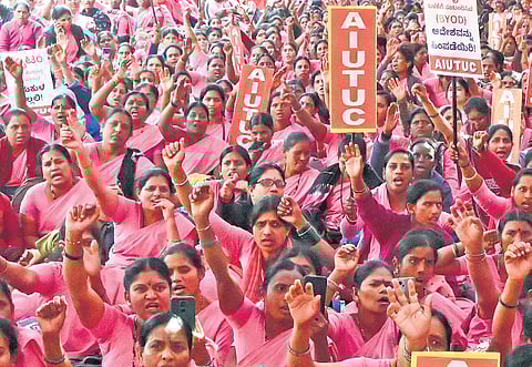 ASHA workers protest at Freedom Park in Bengaluru on Tuesday. Their demands include releasing pending salaries, increasing retirement benefits, annual comprehensive health checkups among others