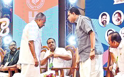 Chief Minister Pinarayi Vijayan returning to his seat after inaugurating the Kerala Legislature International Book Festival on Tuesday