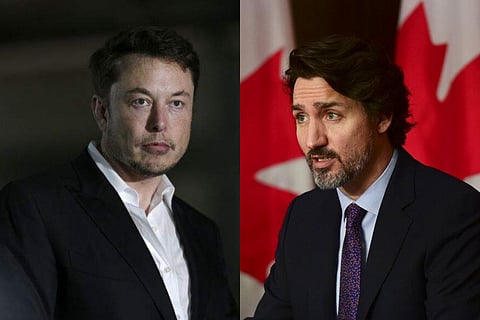 Elon Musk (L) Canadian Prime Minister Justin Trudeau