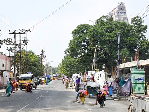 Corporation workers undertaking sanitation works in Srirangam, Tiruchy, on Thursday 