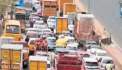 The choked service road near BIEC Junction on Tumakuru Road
