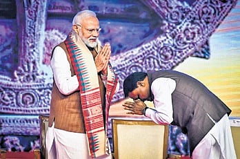 CM Mohan Majhi greets PM Modi at Pravasi Bharatiya Divas on Thursday