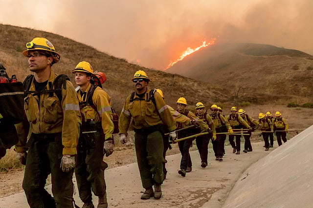 Fire crews battle the Kenneth Fire in the West Hills section of Los Angeles, Thursday, Jan. 9, 2025.