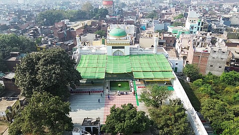 Devotees arrive at the Shahi Jama Masjid to offer prayers, in Sambhal. 