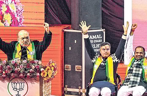 Union Minister Amit Shah at Jhuggi Basti Pradhan Sammelan on Saturday. 