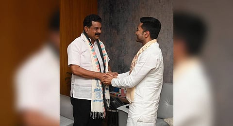 P V Anvar with Trinamool Congress general secretary Abhishek Banerjee.