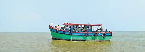 Forest guards patrolling the sea in a hired fishing vessel 