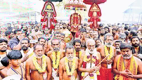 The customary procession by Ambalapuzha petta thullal team at Sabarimala temple on Wednesday.