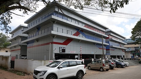Vehicles parked outside the newly-launched multi-level car parking centre near Palayam Market.