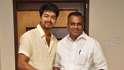 TVK Chief Vijay (L) and party General Secretary N Anand