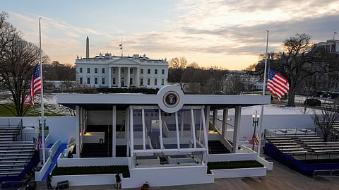 Workers continue with the finishing touches on the presidential reviewing stand on Pennsylvania outside the White House Thursday, Jan. 16, 2025, in Washington, ahead of President-elect Donald Trump's inauguration.