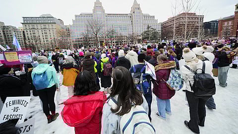 A group gathers at Franklin Park before the People's March, Saturday, Jan. 18, 2025, in Washington.