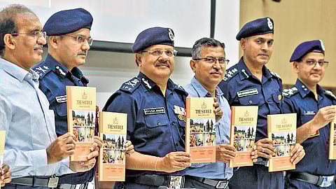 NDRF Director General Piyush Anand releases a special edition of the annual newsletter ‘The Saviour’ at Kondapavuluru on Saturday 