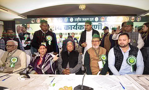 RJD chief Lalu Prasad Yadav with party leaders Rabri Devi, Tejashwi Yadav, and others during the party's national executive committee meeting.