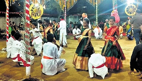 Children perform at the Jadakoppu Kolata Utsavam in Adilabad.