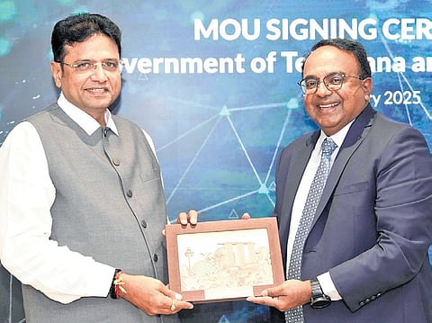 IT Minister Sridhar Babu with a representative of STT Global Data Centres