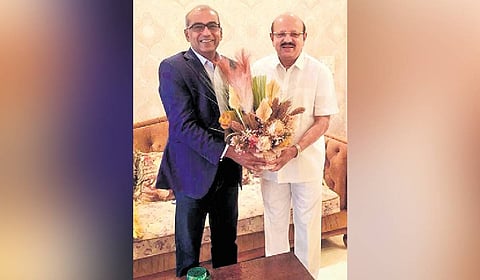 A file photo of Chandra Arya with 
his relative and former minister 
TB Jayachandra in Bengaluru.