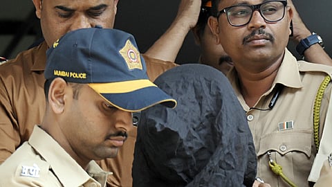 Mohammad Shariful Islam Shehzad, the arrested accused in the Saif Ali Khan attack case being brought to be produced before the Bandra Court, in Mumbai on Sunday.