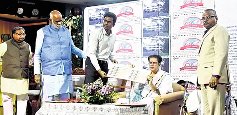 Shri Drumil Kumarji Mahodayshri releasing a Diamond Jubilee Postal Stamp 