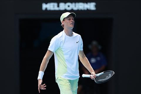 Italy's Jannik Sinner reacts after a point against Denmark's Holger Rune during their men's singles match on day nine of the Australian Open tennis tournament in Melbourne on January 20, 2025.