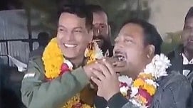 In the 51 second viral video, two men, including ASI Sunil Tomar and the habitual offender Pappu Daima are seen wearing floral garlands at a birthday party and offering pieces from birthday cake to each other amid the resonance of Birthday songs.