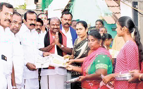 DMK and NTK candidates seeking support of Erode East residents for the by-election, on Monday  