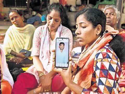 Relatives of Pulianthope resident G Rajan (inset)  wait outside Kilpauk Medical College Hospital in Chennai on Tuesday 
