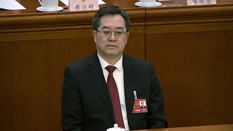 Ding Xuexiang attends a session of China's National People's Congress at the Great Hall of the People in Beijing, Friday, March 10, 2023.