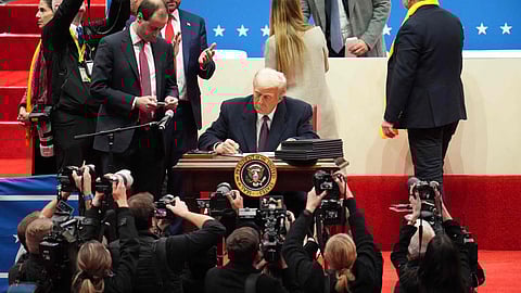 President Donald Trump speaks from Emancipation Hall as House Speaker Mike Johnson, from left, his wife Kelly Johnson, House Majority Leader Steve Scalise, R-La., and his wife Jennifer Scalise, listen after the 60th Presidential Inauguration, Monday