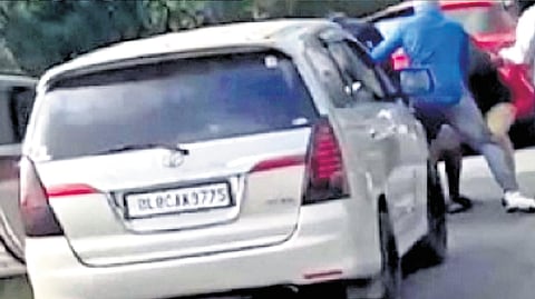 A four-member masked gang stopped an SUV, broke window pane and sprayed chemicals on the face of a Kerala-based businessman and his driver 