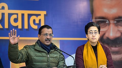Aam Aadmi Party National Convener Arvind Kejriwal and Atishi at a press conference, in New Delhi.