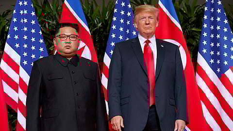 US President Donald Trump, right, meets with North Korean leader Kim Jong Un on Sentosa Island, in Singapore, June 12, 2018.