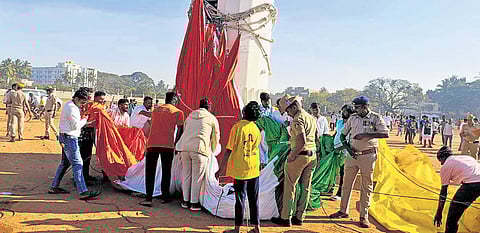 The national flag, which was to fly on top of the tallest flagpole in the country, malfunctions during the Republic Day celebrations in Hosapete on Sunday 