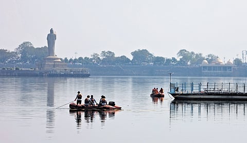 A team searches for a youth who went missing a day prior in Hussainsagar, Hyderabad, on Monday 