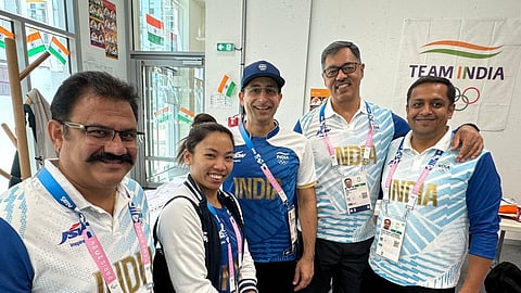 Mirabai Chanu with head coach Vijay Sharma (second right) and other support staff at the Games Village in Paris