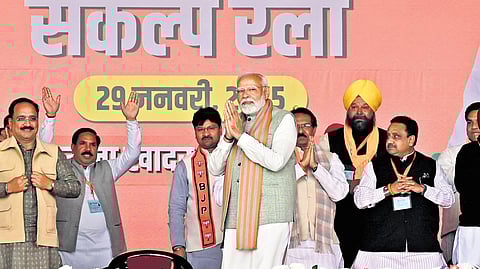 Prime Minister Narendra Modi during a public meeting ahead of the Delhi Assembly elections, at Kartar Nagar in New Delhi, on Wednesday.