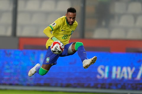 Brazilian soccer player Neymar waves to fans during his presentation ceremony after signing a six-month contract with Santos FC at Vila Belmiro Stadium in Santos, Brazil, Friday, Jan. 31, 2025. 