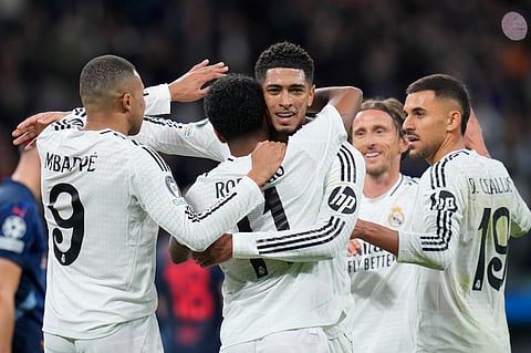 Real Madrid's Rodrygo celebrates with teammates after scoring his side's 2nd goal during the Champions League opening phase soccer match between Real Madrid and FC Salzburg at the Santiago Bernabeu stadium in Madrid, Wednesday, Jan. 22, 2025.