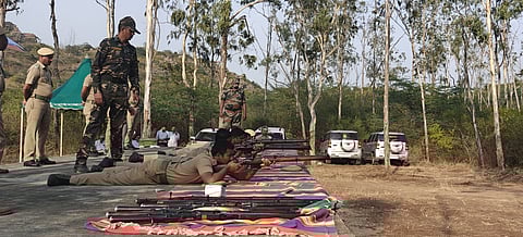 As many as 91 Forest staff gets shooting training at Madukkarai shooting range on Tuesday.