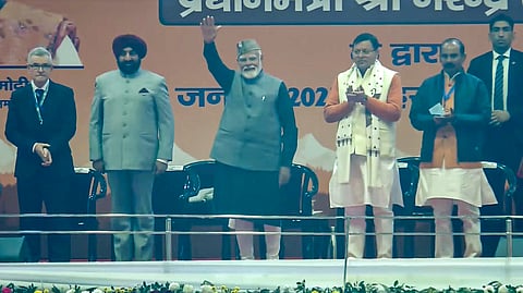 , Prime Minister Narendra Modi with Uttarakhand Governor Lt. Gen. (Retd.) Gurmit Singh and Chief Minister Pushkar Singh Dhami during the opening ceremony of 38th National Games in Dehradun, Uttarakhand.