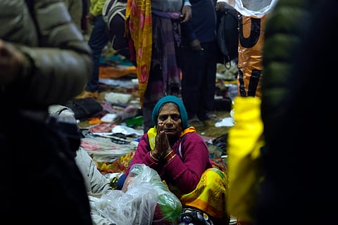 Prayagraj: A stranded devotee is seen after a stampede occurred at Sangam on 'Mauni Amavasya' during the ongoing 'Maha Kumbh Mela' festival, in Prayagraj, Wednesday, Jan. 29, 2025.