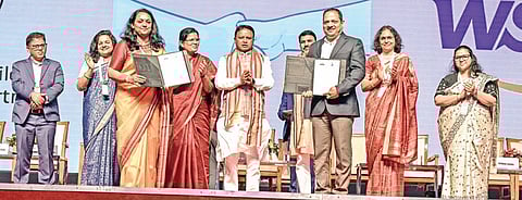 CM Majhi, dy CM Pravati Parida after signing of MoUs at the Utkarsh Odisha Conclave