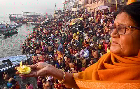 Devotees gather on Mauni Amavasya, at the Ganga Ghat in Varanasi, Wednesday, Jan. 29, 2025.