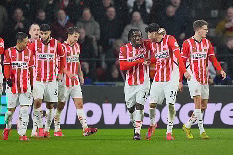 PSV players celebrate after a goal during the Champions League opening phase soccer match between PSV and Liverpool at Phillips Stadium in Eindhoven, Netherlands, Wednesday, Jan. 29, 2025. 